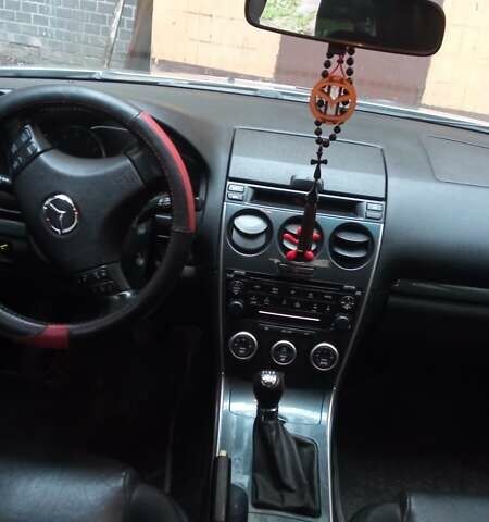 Серый Мазда 6, объемом двигателя 2 л и пробегом 323 тыс. км за 4400 $, фото 1 на Automoto.ua