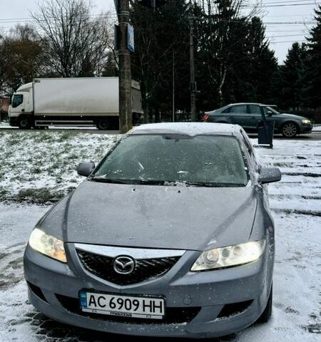 Серый Мазда 6, объемом двигателя 2 л и пробегом 217 тыс. км за 2500 $, фото 1 на Automoto.ua