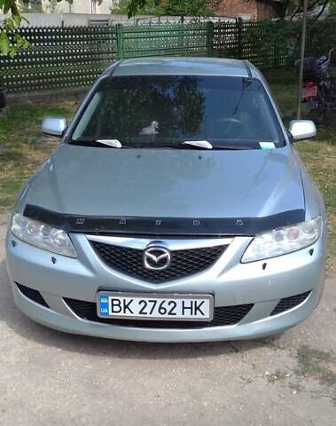 Серый Мазда 6, объемом двигателя 2 л и пробегом 397 тыс. км за 3800 $, фото 1 на Automoto.ua