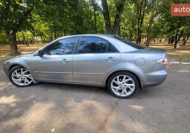 Серый Мазда 6, объемом двигателя 2 л и пробегом 283 тыс. км за 4700 $, фото 1 на Automoto.ua