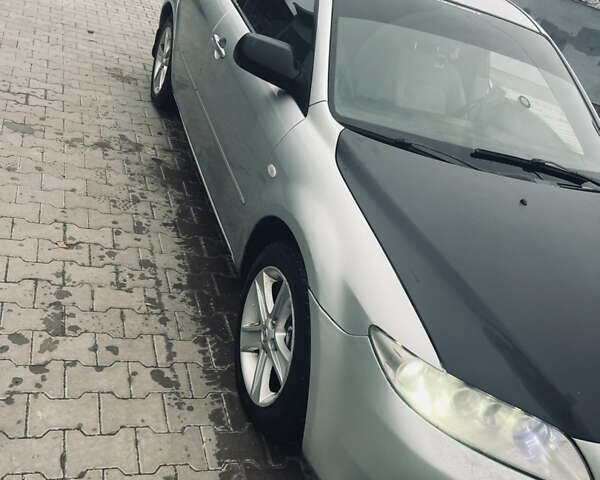 Серый Мазда 6, объемом двигателя 1.8 л и пробегом 300 тыс. км за 3800 $, фото 1 на Automoto.ua