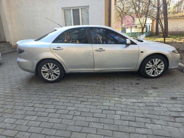 Серый Мазда 6, объемом двигателя 2 л и пробегом 250 тыс. км за 3600 $, фото 1 на Automoto.ua