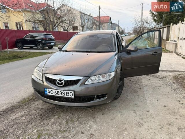 Серый Мазда 6, объемом двигателя 2 л и пробегом 344 тыс. км за 4000 $, фото 1 на Automoto.ua