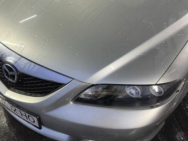 Серый Мазда 6, объемом двигателя 2 л и пробегом 250 тыс. км за 3091 $, фото 1 на Automoto.ua