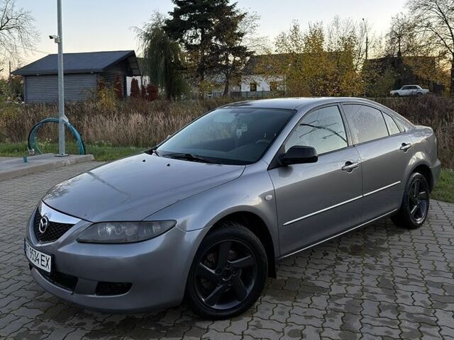 Серый Мазда 6, объемом двигателя 2 л и пробегом 235 тыс. км за 1999 $, фото 1 на Automoto.ua