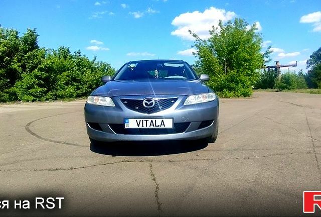 Серый Мазда 6, объемом двигателя 2 л и пробегом 374 тыс. км за 3500 $, фото 1 на Automoto.ua
