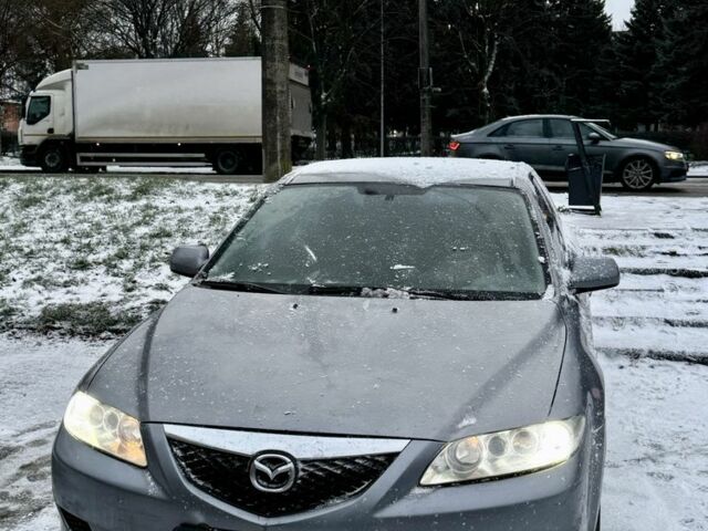 Серый Мазда 6, объемом двигателя 2 л и пробегом 217 тыс. км за 2500 $, фото 1 на Automoto.ua