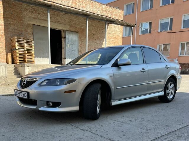 Серый Мазда 6, объемом двигателя 2 л и пробегом 270 тыс. км за 4000 $, фото 1 на Automoto.ua