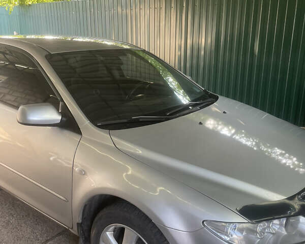 Сірий Мазда 6, об'ємом двигуна 2 л та пробігом 326 тис. км за 3900 $, фото 1 на Automoto.ua