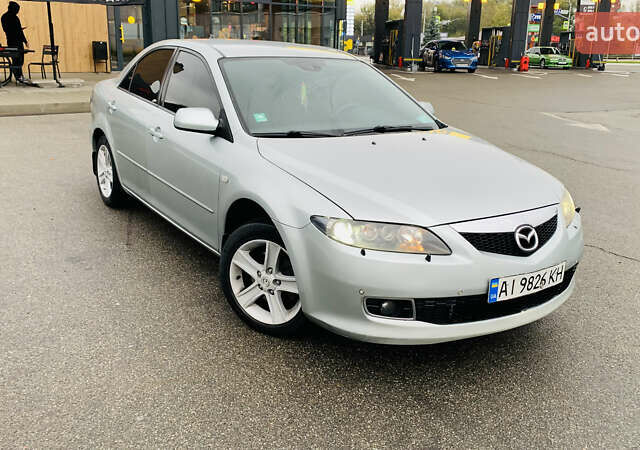 Серый Мазда 6, объемом двигателя 2 л и пробегом 307 тыс. км за 4450 $, фото 1 на Automoto.ua