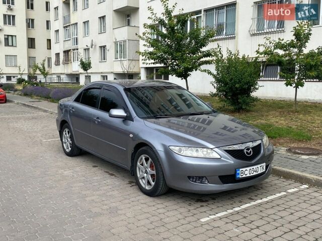 Серый Мазда 6, объемом двигателя 2 л и пробегом 288 тыс. км за 2999 $, фото 1 на Automoto.ua