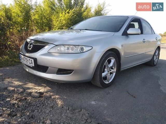 Серый Мазда 6, объемом двигателя 2 л и пробегом 254 тыс. км за 4700 $, фото 1 на Automoto.ua