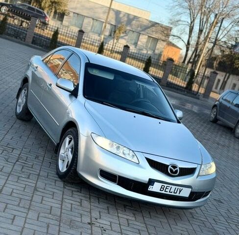 Серый Мазда 6, объемом двигателя 2 л и пробегом 215 тыс. км за 4500 $, фото 1 на Automoto.ua