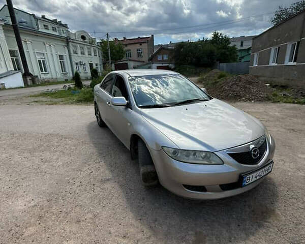 Серый Мазда 6, объемом двигателя 2 л и пробегом 275 тыс. км за 2970 $, фото 1 на Automoto.ua