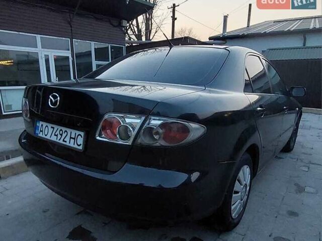 Серый Мазда 6, объемом двигателя 2 л и пробегом 390 тыс. км за 3200 $, фото 1 на Automoto.ua