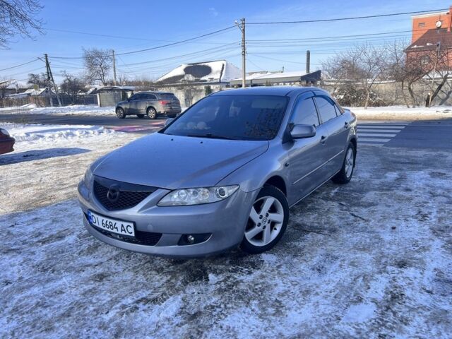 Серый Мазда 6, объемом двигателя 2 л и пробегом 230 тыс. км за 4999 $, фото 1 на Automoto.ua