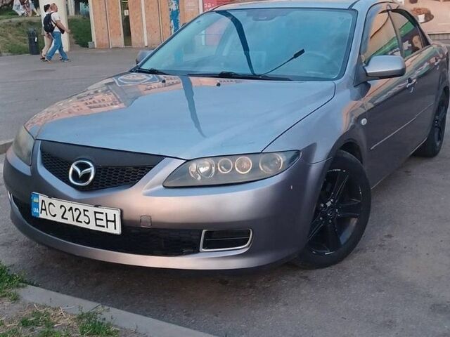 Серый Мазда 6, объемом двигателя 2 л и пробегом 303 тыс. км за 4500 $, фото 1 на Automoto.ua