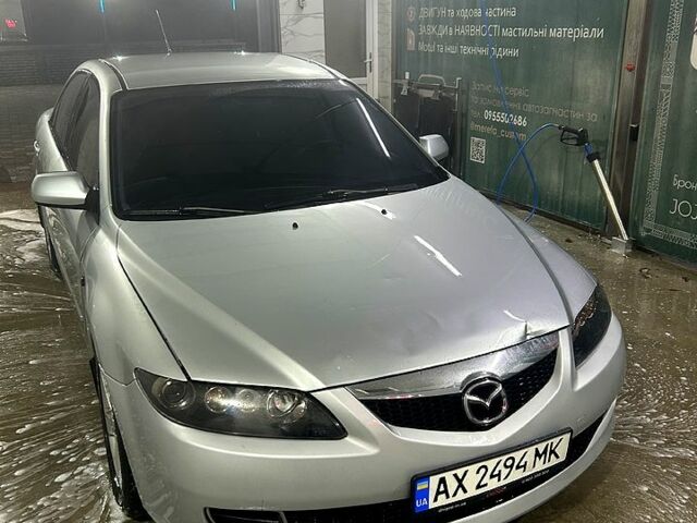 Серый Мазда 6, объемом двигателя 2 л и пробегом 265 тыс. км за 3800 $, фото 1 на Automoto.ua