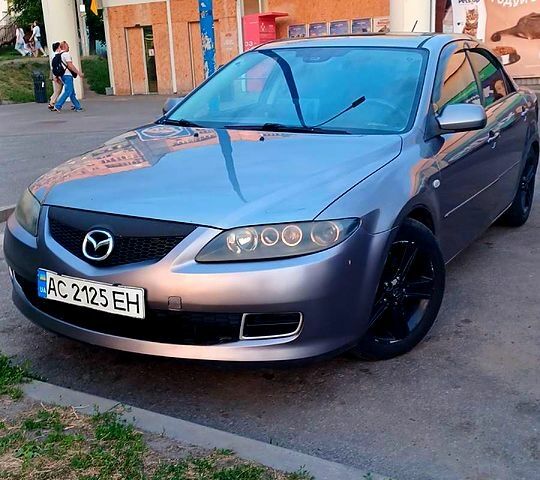 Серый Мазда 6, объемом двигателя 2 л и пробегом 303 тыс. км за 4500 $, фото 1 на Automoto.ua