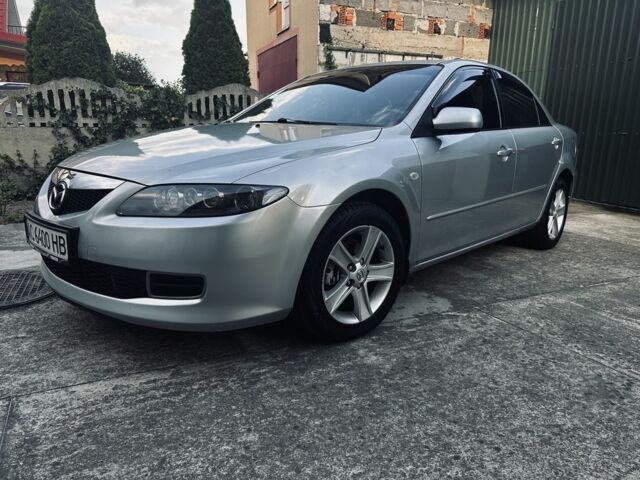 Серый Мазда 6, объемом двигателя 2 л и пробегом 302 тыс. км за 4500 $, фото 1 на Automoto.ua