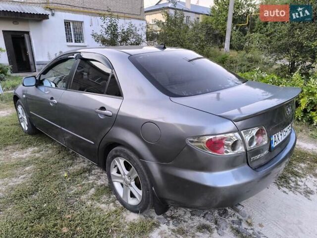 Серый Мазда 6, объемом двигателя 2 л и пробегом 260 тыс. км за 6000 $, фото 1 на Automoto.ua