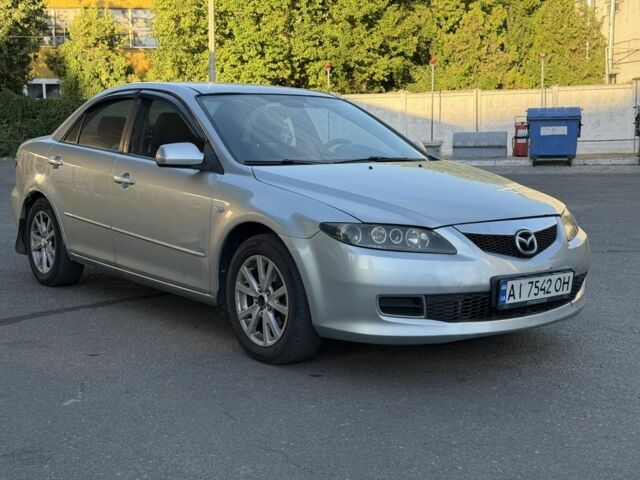 Серый Мазда 6, объемом двигателя 2 л и пробегом 240 тыс. км за 3011 $, фото 1 на Automoto.ua