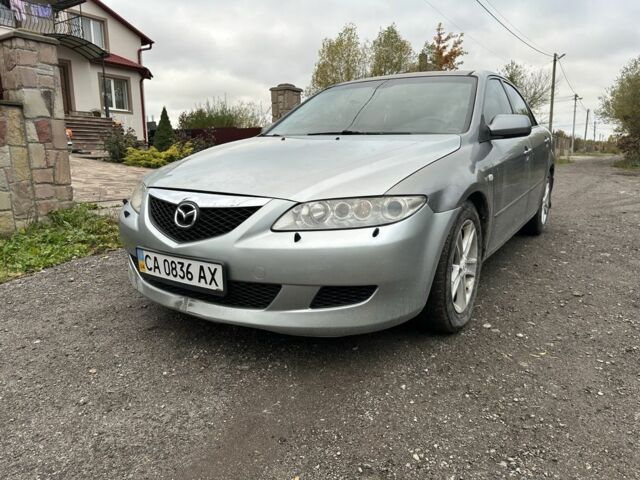 Серый Мазда 6, объемом двигателя 2 л и пробегом 302 тыс. км за 1901 $, фото 1 на Automoto.ua
