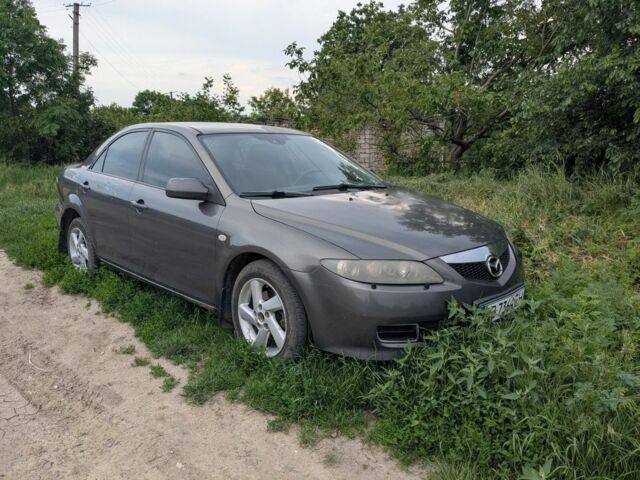 Серый Мазда 6, объемом двигателя 2 л и пробегом 290 тыс. км за 3200 $, фото 1 на Automoto.ua