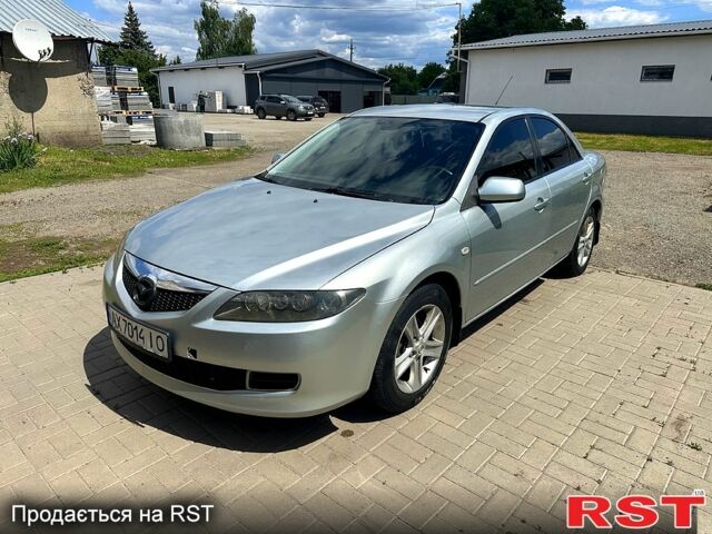 Серый Мазда 6, объемом двигателя 1.8 л и пробегом 253 тыс. км за 2800 $, фото 1 на Automoto.ua