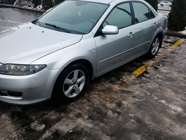 Серый Мазда 6, объемом двигателя 2 л и пробегом 265 тыс. км за 5500 $, фото 1 на Automoto.ua