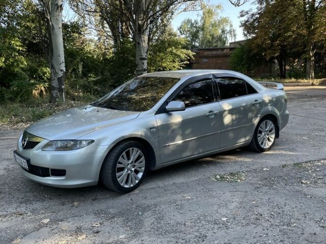 Серый Мазда 6, объемом двигателя 2 л и пробегом 245 тыс. км за 4113 $, фото 1 на Automoto.ua