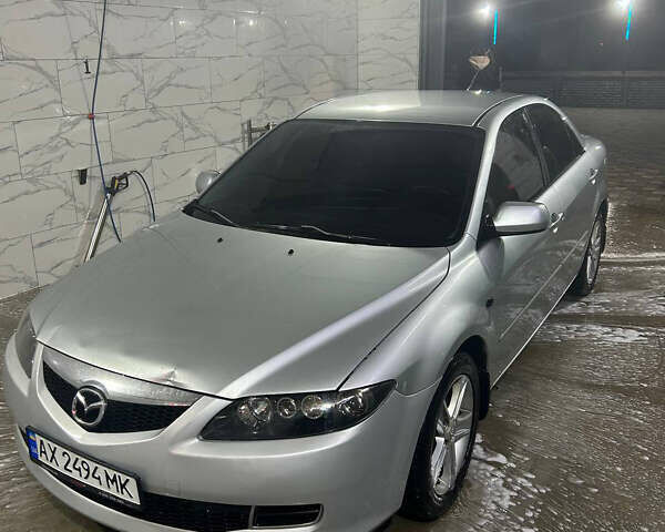 Серый Мазда 6, объемом двигателя 2 л и пробегом 265 тыс. км за 3800 $, фото 1 на Automoto.ua