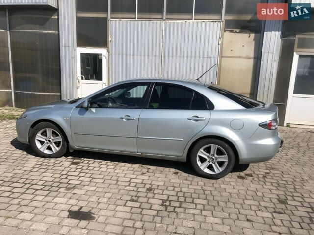 Сірий Мазда 6, об'ємом двигуна 2 л та пробігом 239 тис. км за 4600 $, фото 1 на Automoto.ua