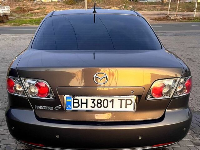 Сірий Мазда 6, об'ємом двигуна 2 л та пробігом 268 тис. км за 6300 $, фото 1 на Automoto.ua