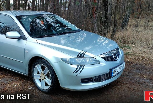 Серый Мазда 6, объемом двигателя 2 л и пробегом 300 тыс. км за 4000 $, фото 1 на Automoto.ua