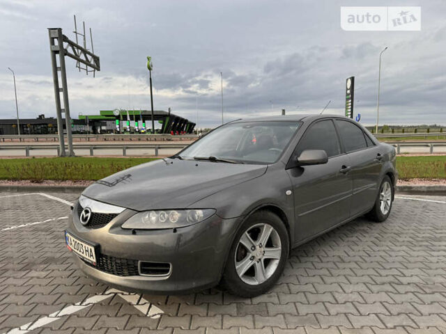 Серый Мазда 6, объемом двигателя 2 л и пробегом 258 тыс. км за 5200 $, фото 1 на Automoto.ua