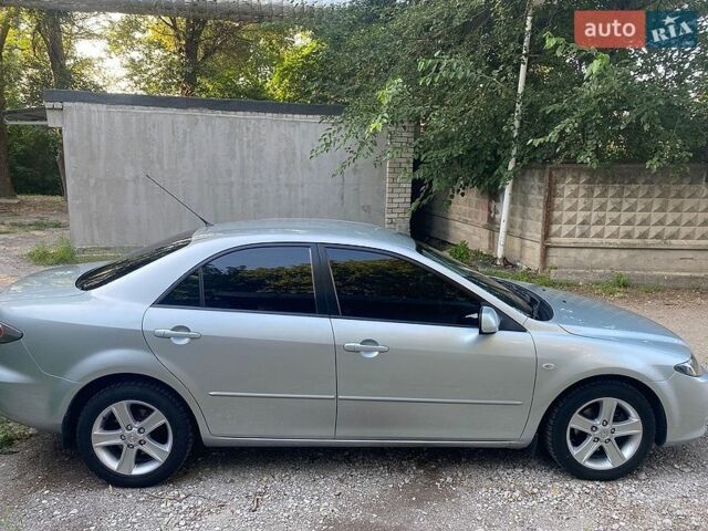 Серый Мазда 6, объемом двигателя 2 л и пробегом 122 тыс. км за 6900 $, фото 1 на Automoto.ua