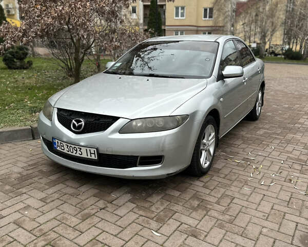 Серый Мазда 6, объемом двигателя 2 л и пробегом 450 тыс. км за 3999 $, фото 1 на Automoto.ua