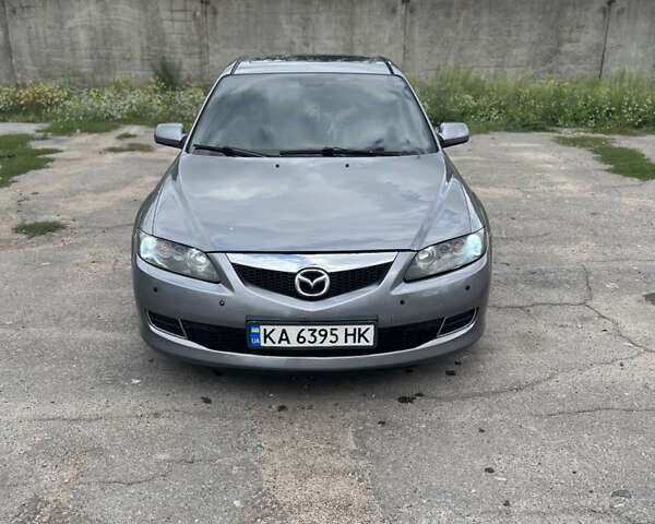 Серый Мазда 6, объемом двигателя 2 л и пробегом 477 тыс. км за 6000 $, фото 1 на Automoto.ua
