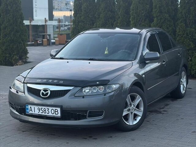 Серый Мазда 6, объемом двигателя 2 л и пробегом 243 тыс. км за 4500 $, фото 1 на Automoto.ua