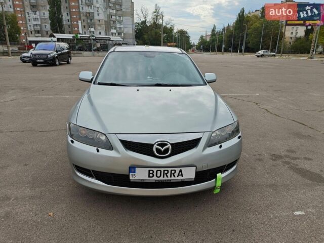 Серый Мазда 6, объемом двигателя 2 л и пробегом 233 тыс. км за 5000 $, фото 1 на Automoto.ua