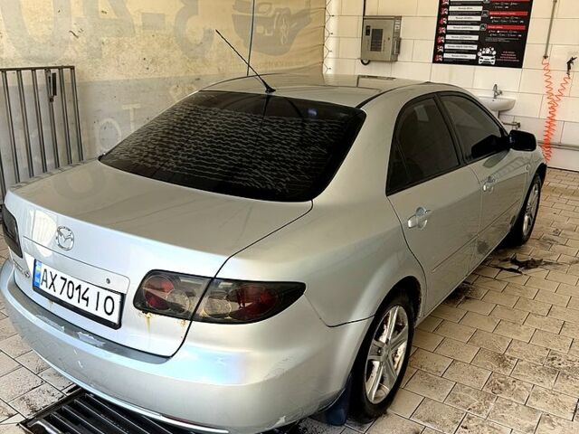 Серый Мазда 6, объемом двигателя 1.8 л и пробегом 252 тыс. км за 3600 $, фото 1 на Automoto.ua