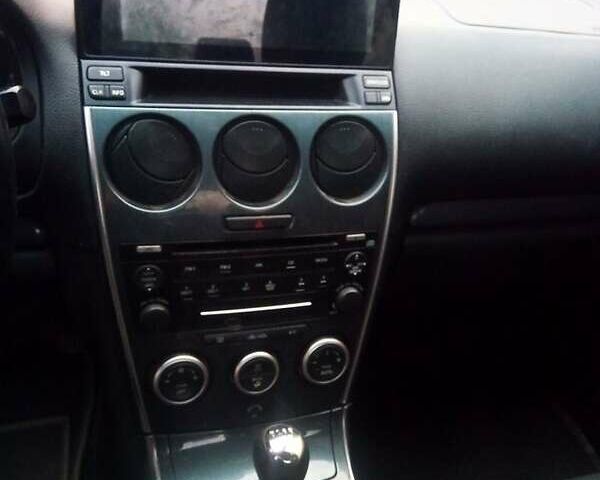 Серый Мазда 6, объемом двигателя 2 л и пробегом 189 тыс. км за 2000 $, фото 1 на Automoto.ua