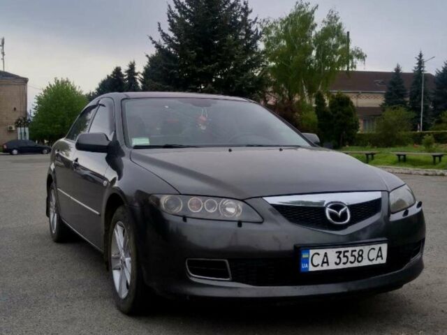 Серый Мазда 6, объемом двигателя 2 л и пробегом 195 тыс. км за 5800 $, фото 1 на Automoto.ua
