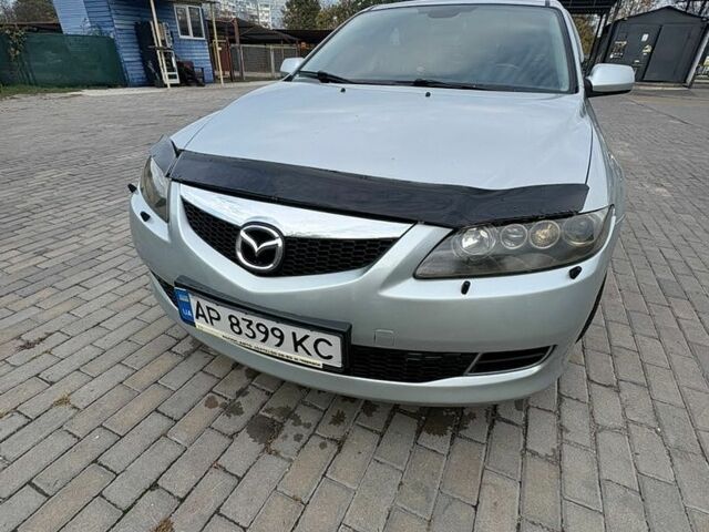Серый Мазда 6, объемом двигателя 2 л и пробегом 212 тыс. км за 5800 $, фото 1 на Automoto.ua