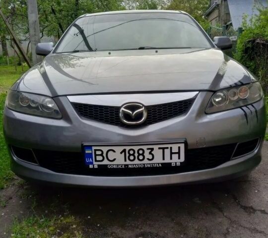Серый Мазда 6, объемом двигателя 2 л и пробегом 274 тыс. км за 3112 $, фото 1 на Automoto.ua