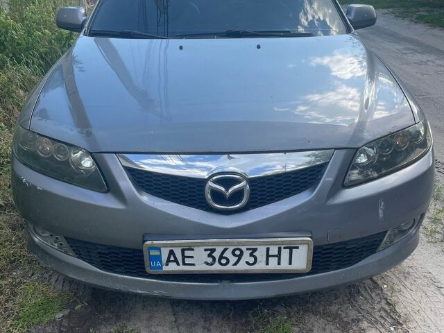 Серый Мазда 6, объемом двигателя 2 л и пробегом 308 тыс. км за 6750 $, фото 1 на Automoto.ua