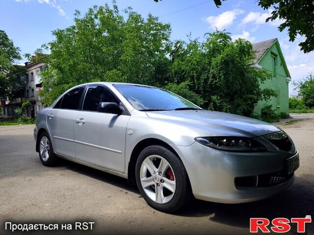 Серый Мазда 6, объемом двигателя 2 л и пробегом 300 тыс. км за 5200 $, фото 1 на Automoto.ua
