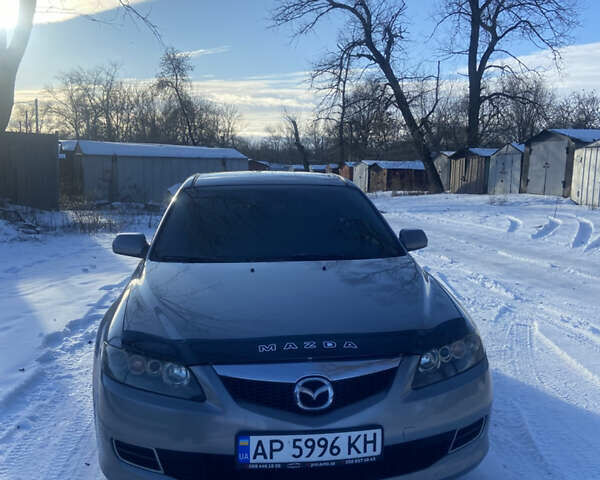 Сірий Мазда 6, об'ємом двигуна 2 л та пробігом 234 тис. км за 6000 $, фото 1 на Automoto.ua
