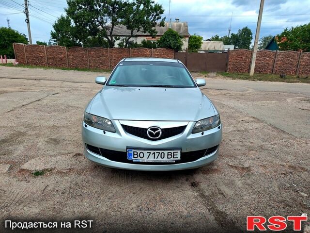 Серый Мазда 6, объемом двигателя 2 л и пробегом 187 тыс. км за 5000 $, фото 1 на Automoto.ua